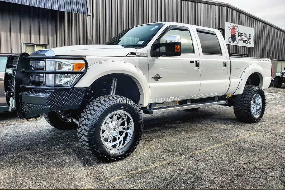F-250 on polished forged wheels, outside the shop