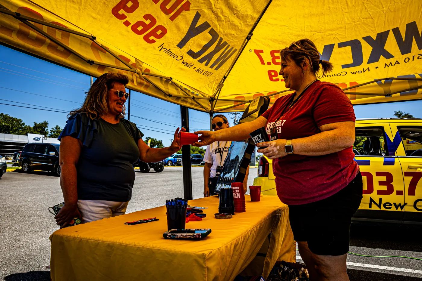 The crowd and radio tent at the 2025 Apple Off Road Truck and Jeep Show